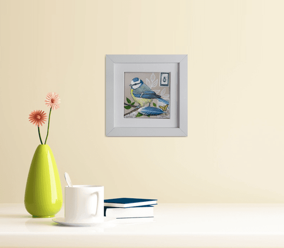 The blue tit feather  (framed and ready to hang)