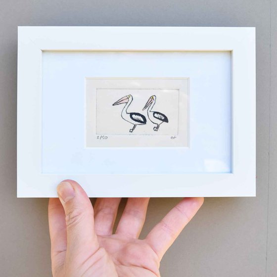 Small framed two pelicans