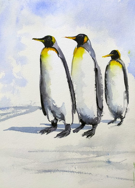 Three penguins on a morning walk