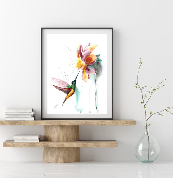 Flying Hummingbird with flower