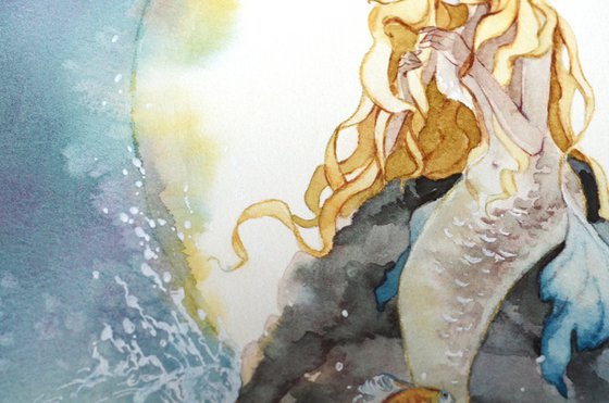 Golden haired mermaid