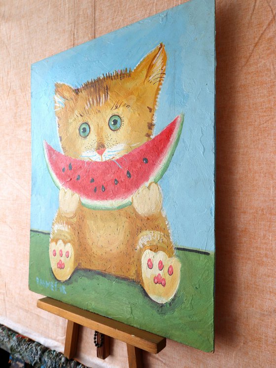 A CAT NAMED SLICE, AND A SLICE OF WATERMELON.