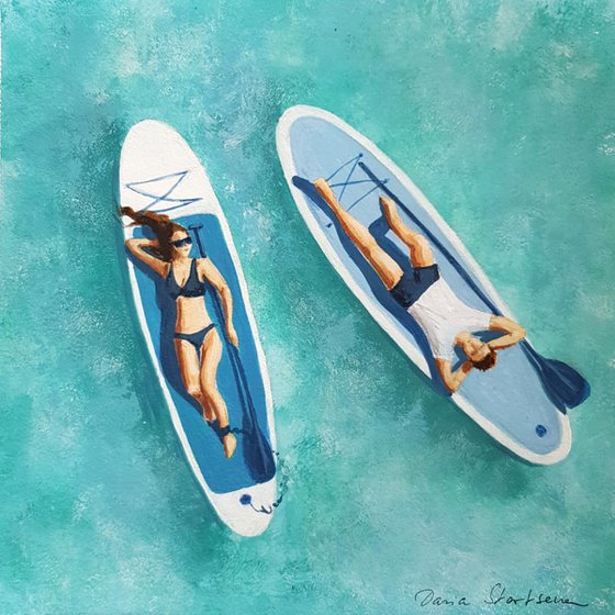 Couple on Sup boards