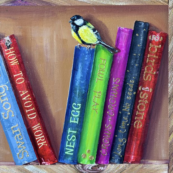 Bookshelf with birds