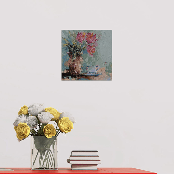 Coffee and tulips on the table