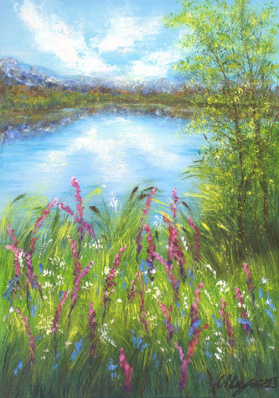 Lake with wildflowers meadow