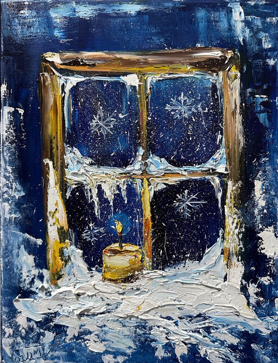 Winter window and candle