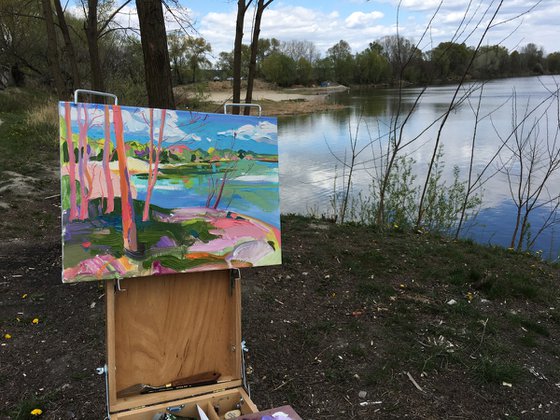 Pink trees by the lake