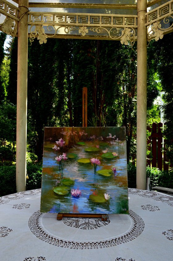 Pond with pink lilies