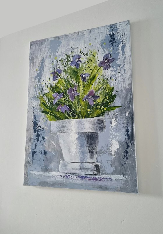 A Pot with Violets