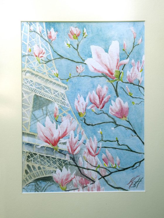 Eiffel tower in blooming magnolia