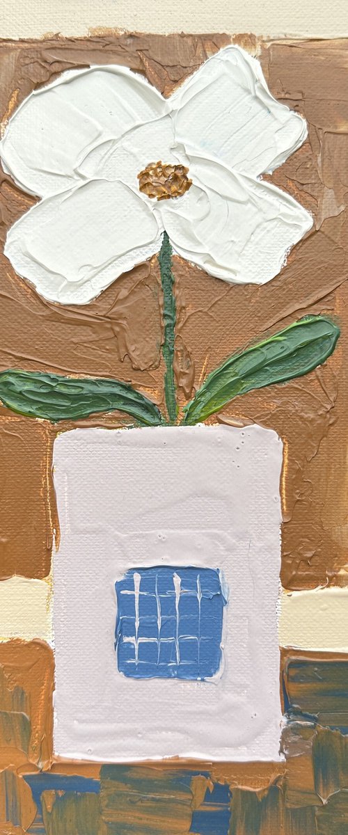 White flower by Guzaliya Xavier