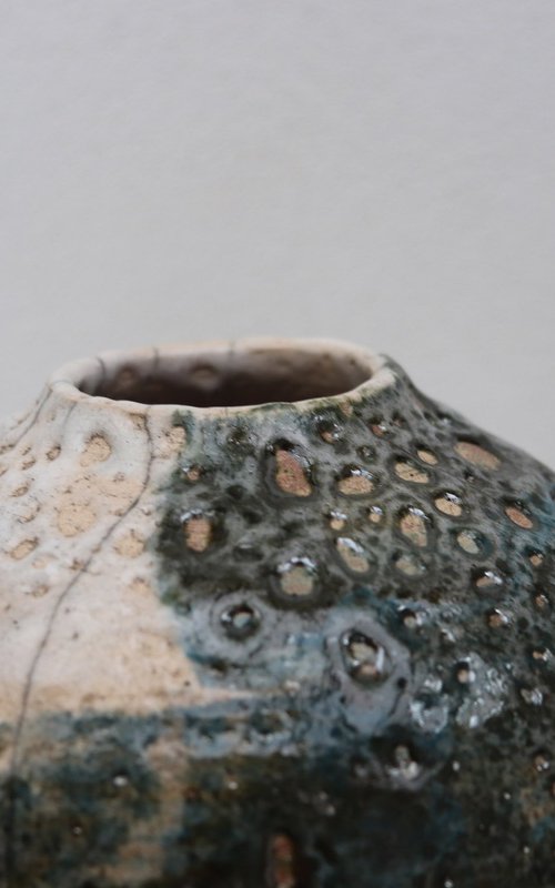 Raku and black smoked vessel. by Koen Lybaert