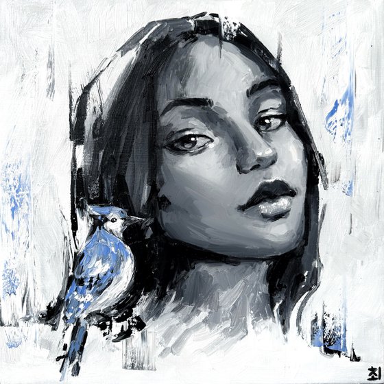 Portrait of a girl with a blue jay