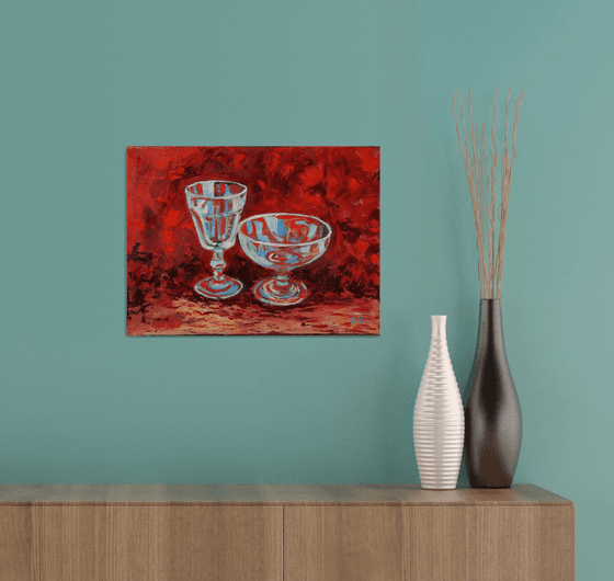 Wine glass on red.