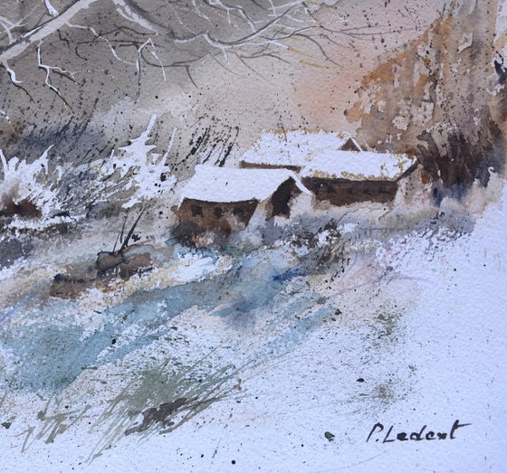 A few houses in the snow