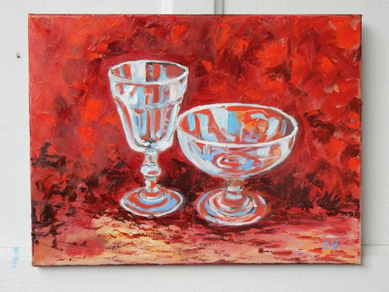 Wine glass on red.