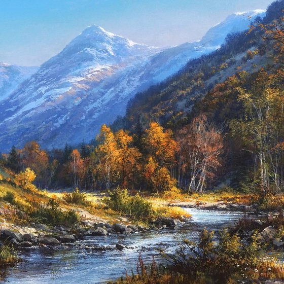 Mountain river embraced by autumn