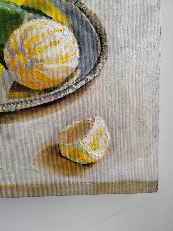 Lemon fruit slices on metal tray still life