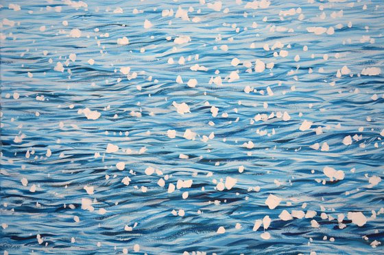 Glare on blue water.