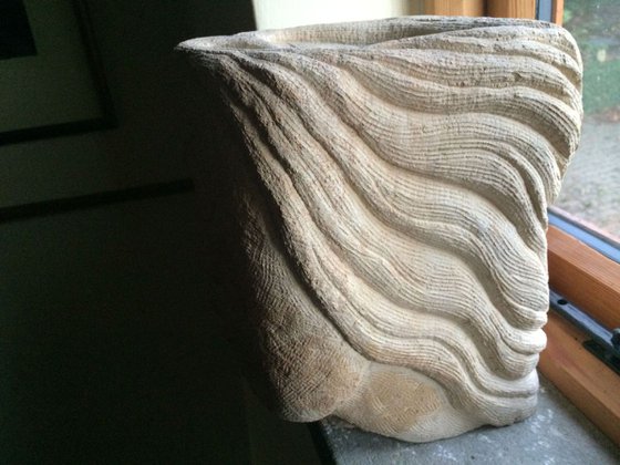 The Kiss; small stone carving
