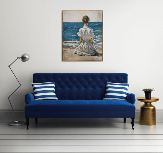 Woman by the ocean.