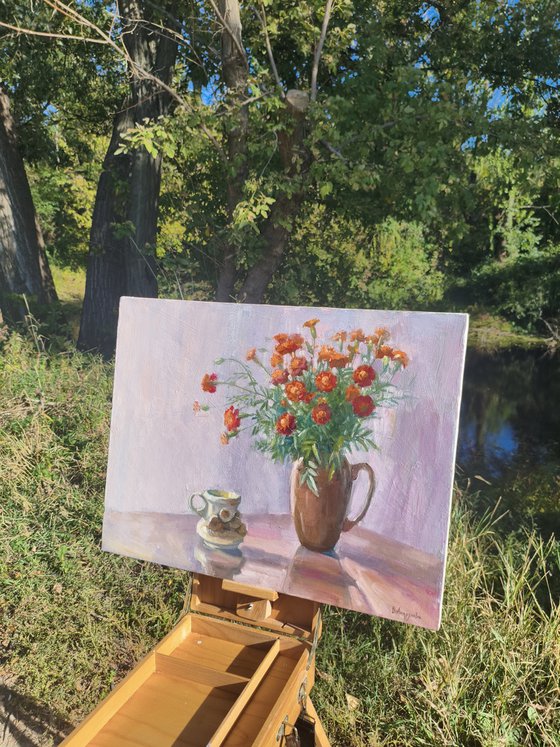 Marigolds in a clay pot