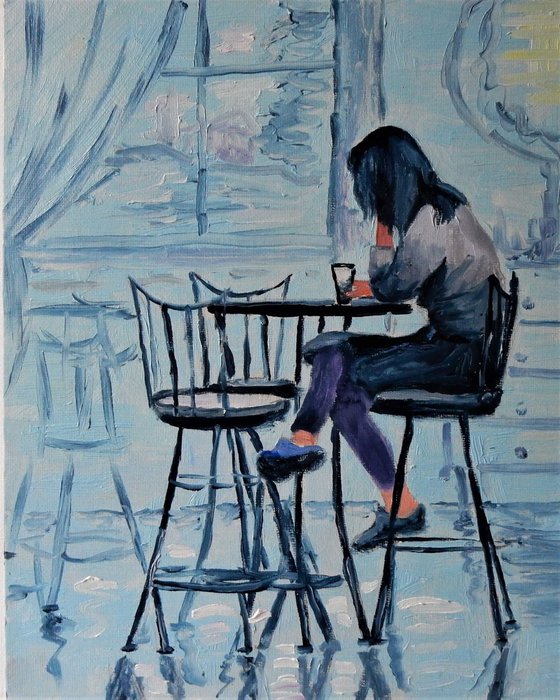 Woman in a cafe.