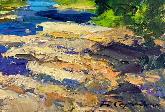 River against the Backdrop of Mountain Slopes