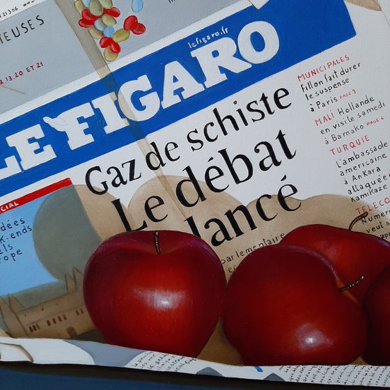 Newspapers with apples