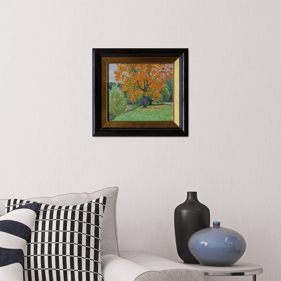 Autumn maple by the pond
