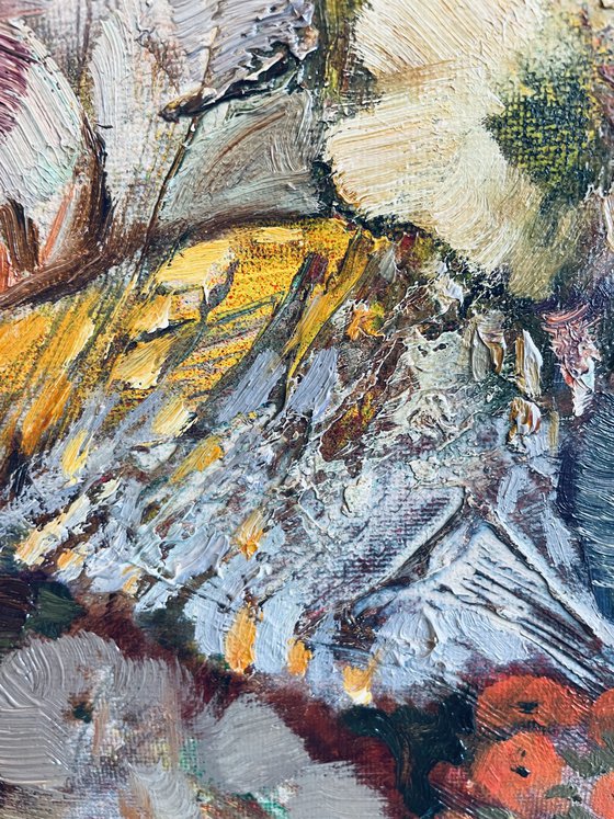 A lush bouquet in a pink vase