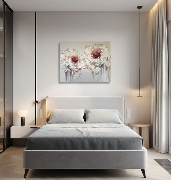 Two large white flowers on white