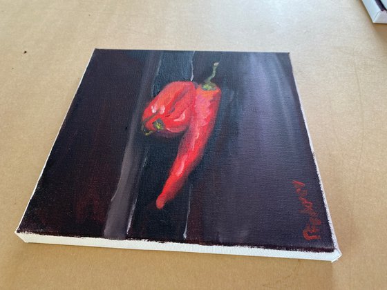 Still life with red peppers