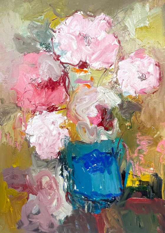 Pink flowers in a blue jug