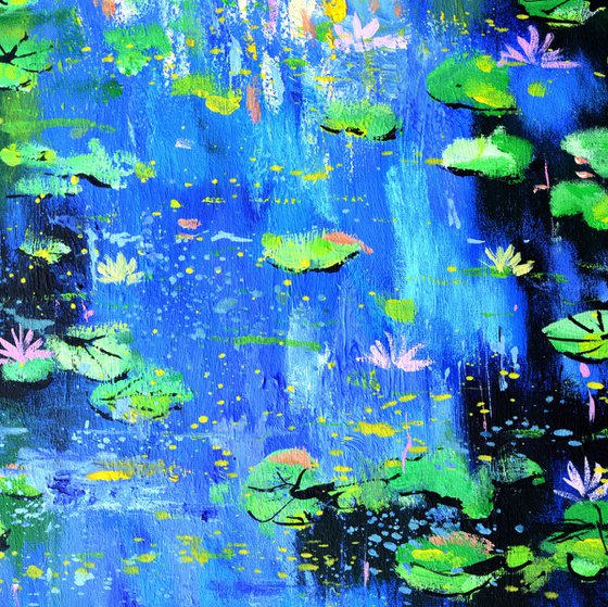 Waterlilies on a blue pond