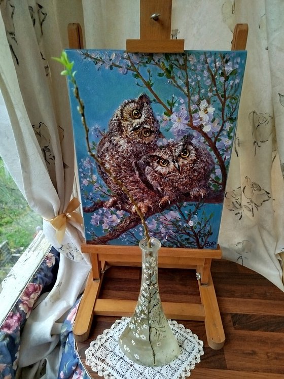 Spring landscape with owls
