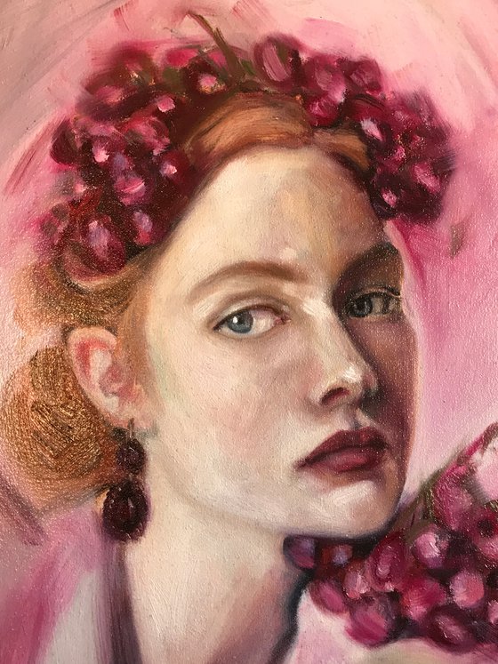 Red hair girl with grape