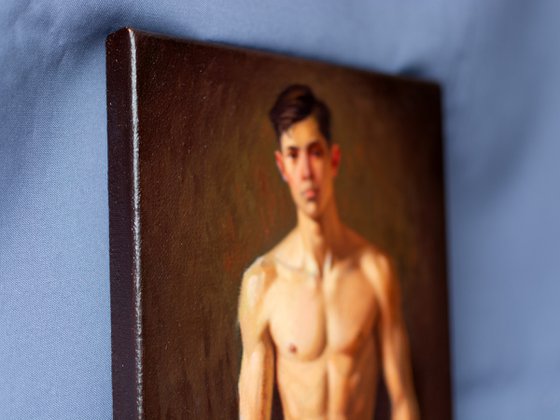 YOUNG MAN WITH A BASEBALL GLOVE