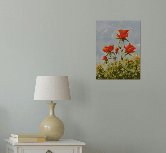 Red roses in garden. Gift idea for her