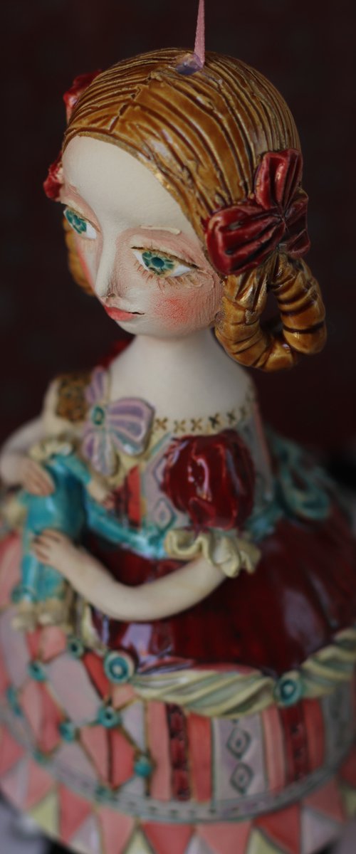 Girl with a puppet. Hanging sculpture, bell doll by Elya Yalonetski by Elya Yalonetski