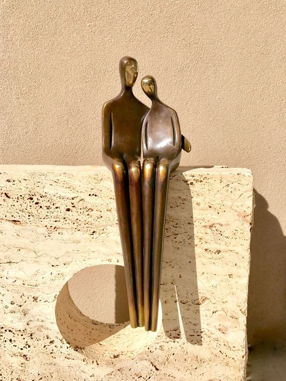 “Close to me "  50 cm sitting tall bronze couple in dark brown patina"