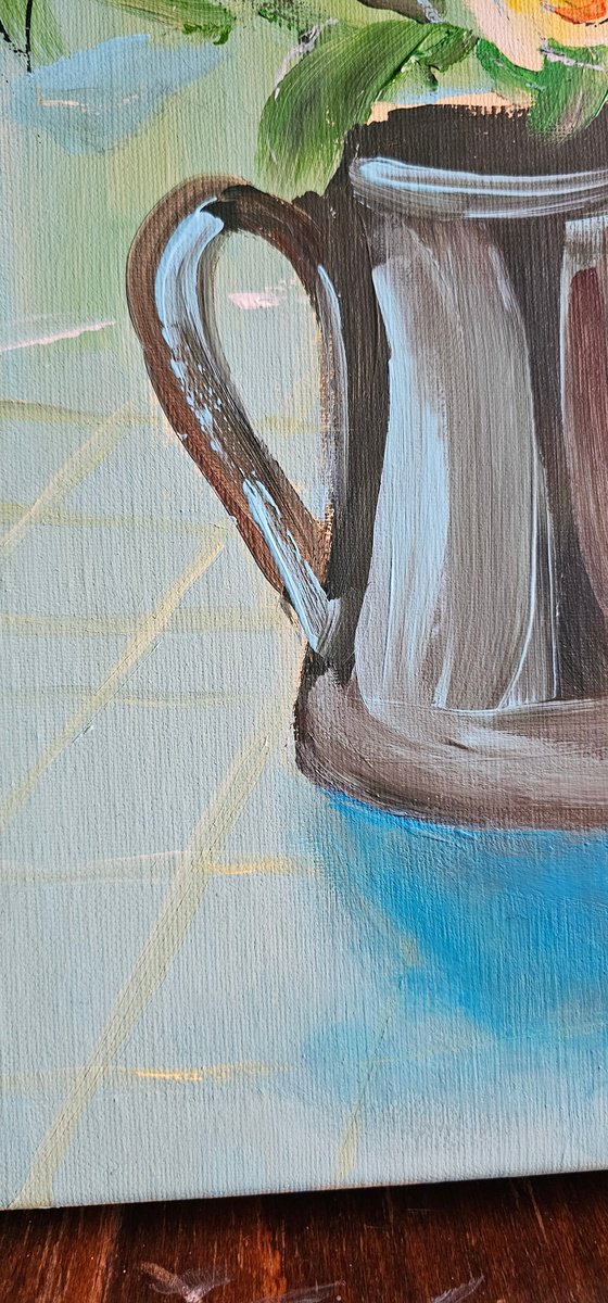 Blooming yellow roses on blue