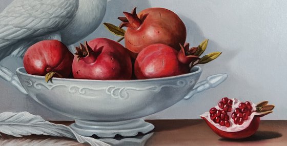 Still life with pomegranates and dove