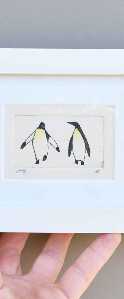 Small framed two penguins by Sally Fisher