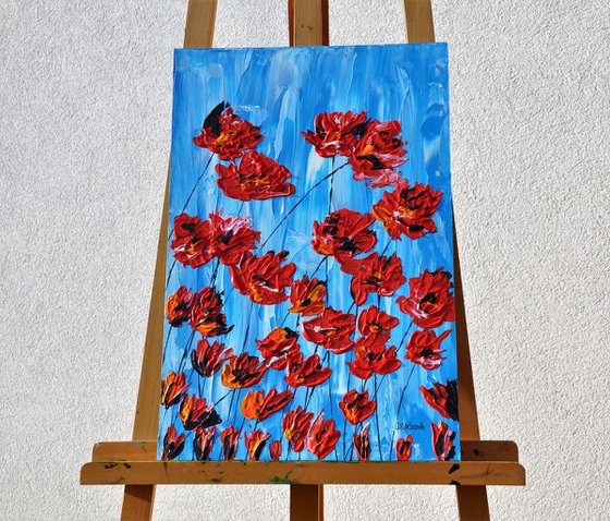 Poppies On Blue