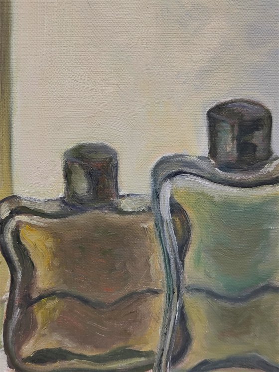 Still life with cologne bottles