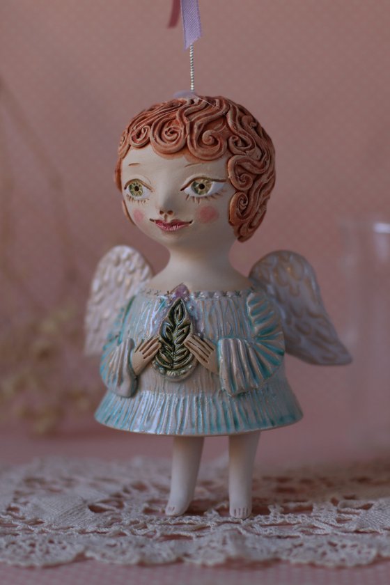 Tiny hanging sculpture. Angel