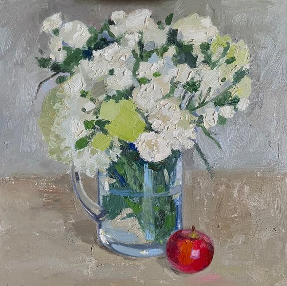 Flowers and apple