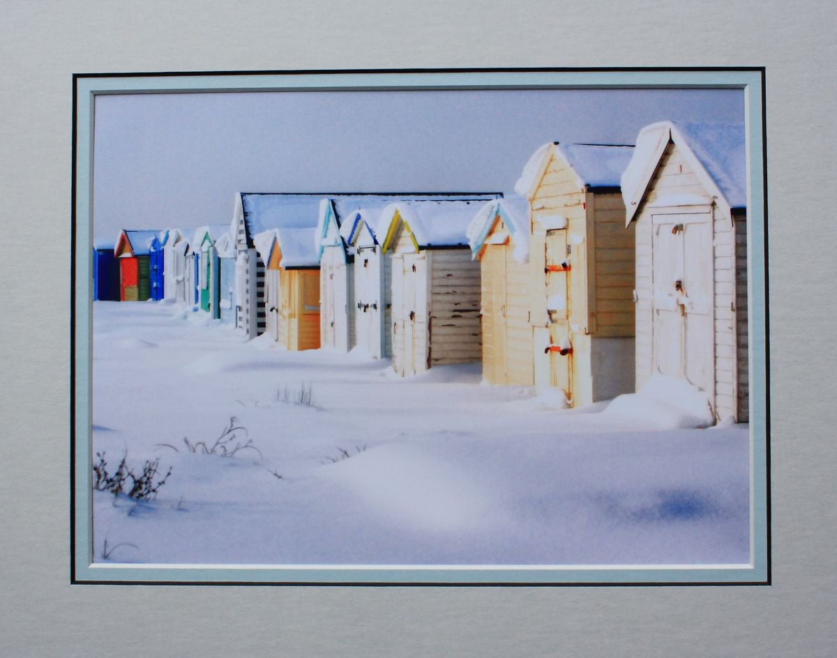 Beach Huts in Snow by Robin Clarke